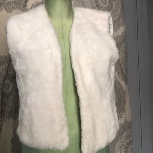 White furry vest